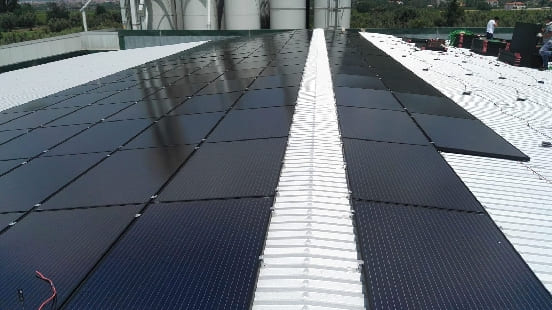 Fase di lavoro fotovoltaico da 144kWp su opificio